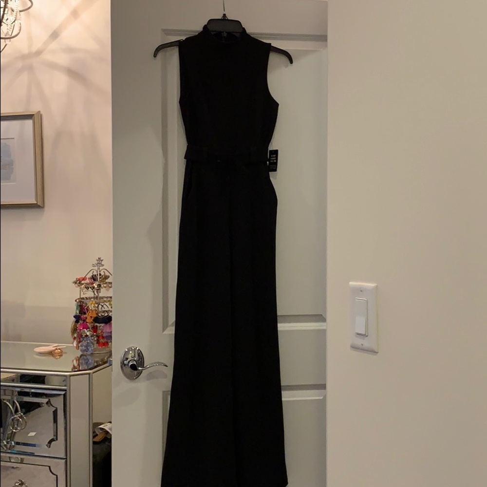 Black express jumpsuit with belt. NWT